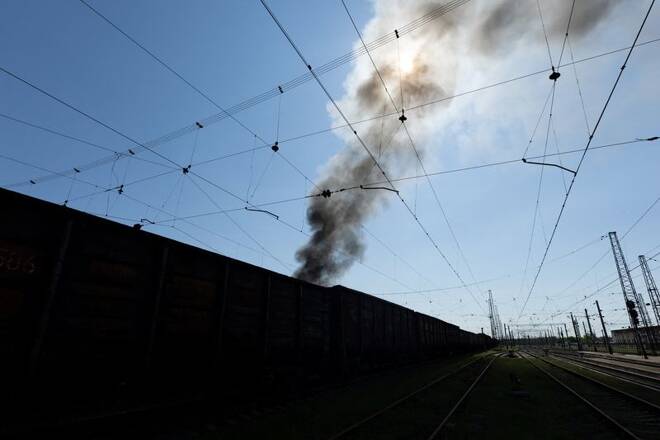 Smokes rises following a military strike on a facility near the railway station, amid Russia's invasion of Ukraine, in the frontline city of Lyman