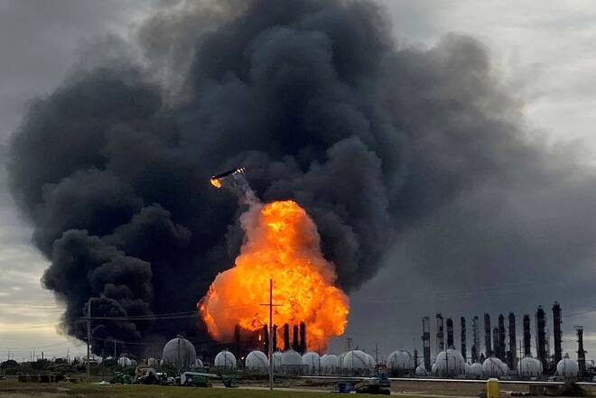 A process tower flies through the air after exploding at the TPC Group Petrochemical Plant in Port Neches
