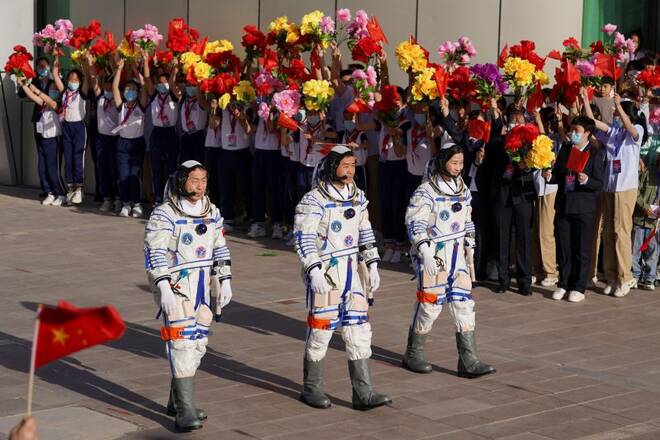 Chinese astronauts Chen Dong, Liu Yang and Cai Xuzhe of the Shenzhou-14 spaceflight mission, at Jiuquan Satellite Launch Center