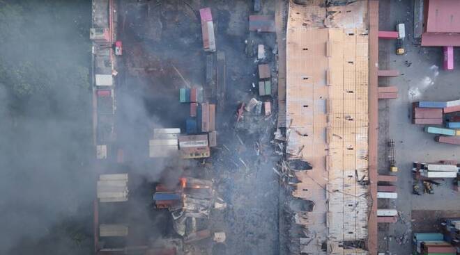 Smoke rises from the spot after a massive fire broke out in an inland container depot at Sitakunda, near the port city Chittagong