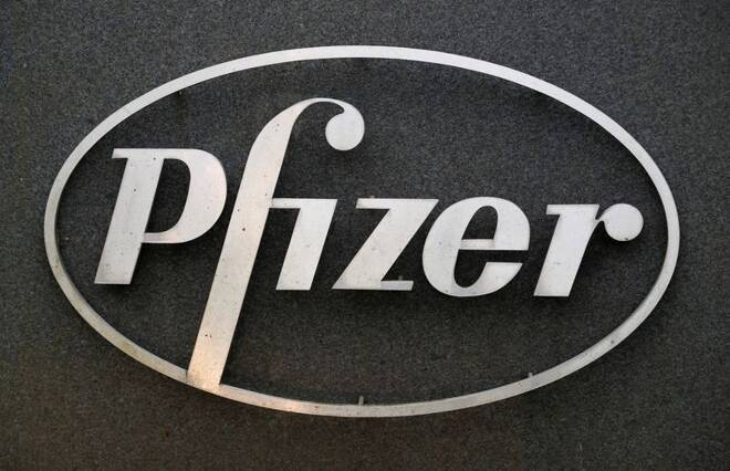 Pfizer logo is seen at the entrance to Pfizer UK headquarters in Tadworth