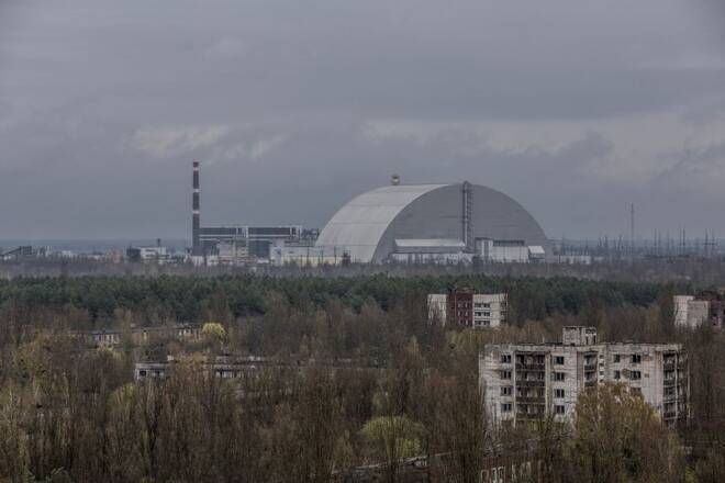 General view of the New Safe Confinement structure over the old sarcophagus covering the damaged fourth reactor at the Chornobyl Nuclear Power Plant
