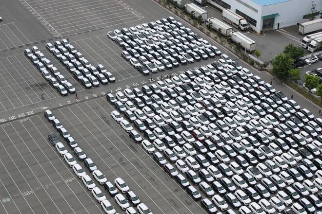 A general view of Kia Motor's finished cars parked and waiting to be transported by car carriers which are now on strike at their factory, in Gwangju
