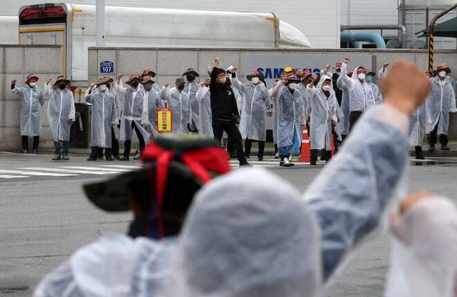 Members of the Cargo Truckers Solidarity union take part in a protest in front of a Samsung Electronics' factory in Gwangju