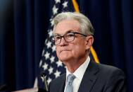 FILE PHOTO - Federal Reserve Board Chair Jerome Powell speaks about the U.S. economy and Fed interest rate plans during news conference following Federal Open Market Committee (FOMC) meeting in Washington