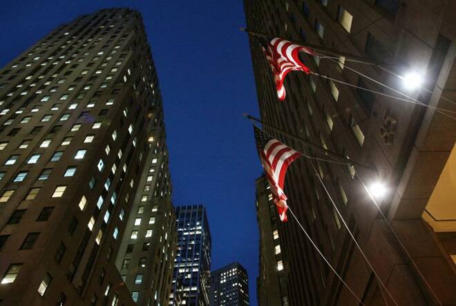 Flags fly outside 85 Broad St., the Goldman Sachs headquarters in New York's financial district