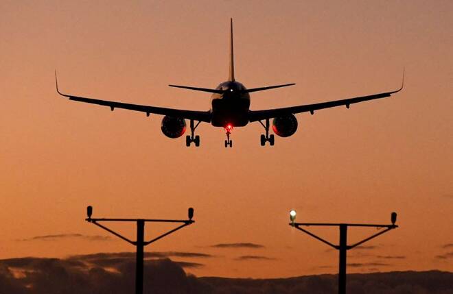 A passenger aircraft descends to land at Heathrow Airport in London