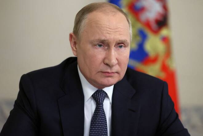 Russian President Vladimir Putin chairs a meeting with members of the Security Council via video link in Moscow