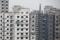 Men work at a construction site of residential apartment blocks in Beijing