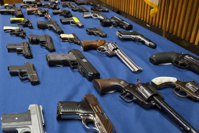 Confiscated illegal guns are displayed during a news conference at New York City Police (NYPD) Headquarters in New York