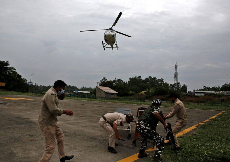 A helicopter arrives carrying injured people for treatment at Sher-i-Kashmir Institute of Medical Sciences hospital in Srinagar