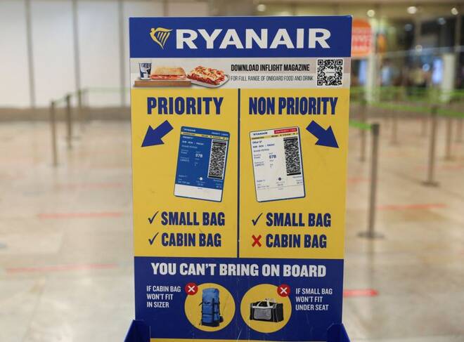 A sign is pictured in the Ryanair check-in area at Adolfo Suarez Madrid-Barajas Airport, in Madrid