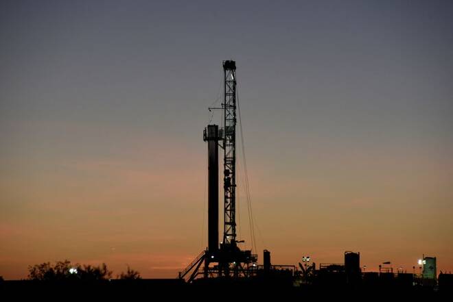 A horizontal drilling rig on a lease owned by Parsley Energy operates at sunrise in the Permian Basin near Midland