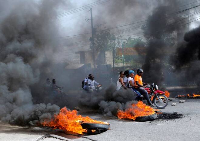 Demonstrators block roads to protest fuel shortages, in Port-au-Prince