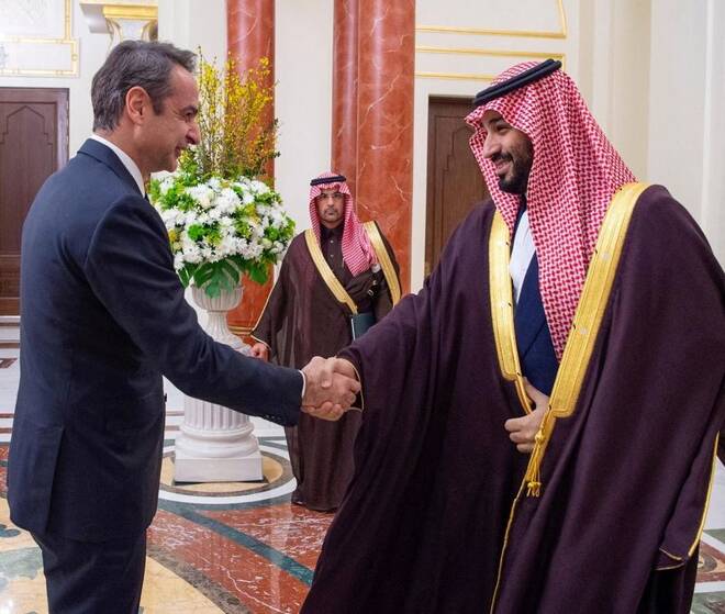Saudi Arabia's Crown Prince Mohammed bin Salman shakes hands with Greek Prime Minister Kyriakos Mitsotakis in Riyadh