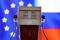 Illustration shows model of petrol pump, EU and Russian flag colours