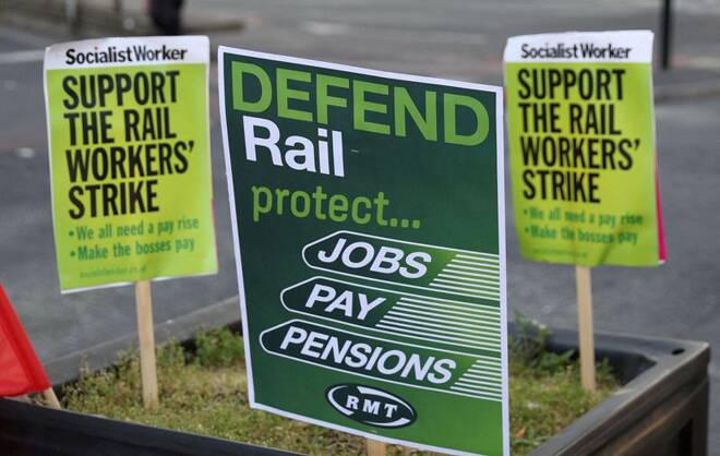 Placards are seen near a union picket line on the first day of a national rail strike at Manchester Piccadilly Station in Manchester