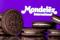 Oreo biscuits are seen displayed in front of the Mondelez International logo in this illustration picture