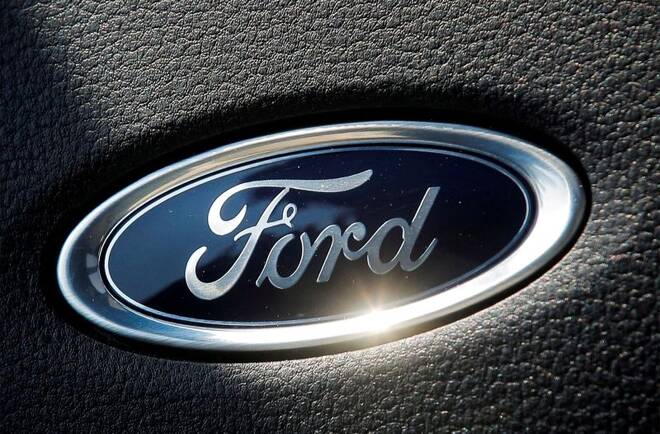 The Ford name plate is seen on the interior of the Ford F-150 Lightning pickup truck during a press event in New York