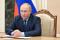 Russian President Vladimir Putin chairs a meeting with members of the Security Council via video link in Moscow