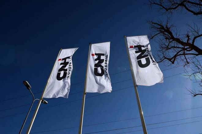 Flags with CNH Industrial logo are pictured outside CNH Industrial building in Turin