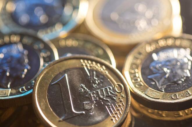 One Euro and British pound coins are seen in this illustration taken