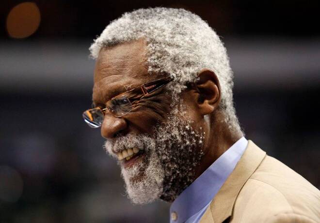 Boston Celtic great & NBA Hall of Famer Bill Russell is all smiles on the floor before the start of the Slam Dunk contest during NBA All-Star weekend in Dallas