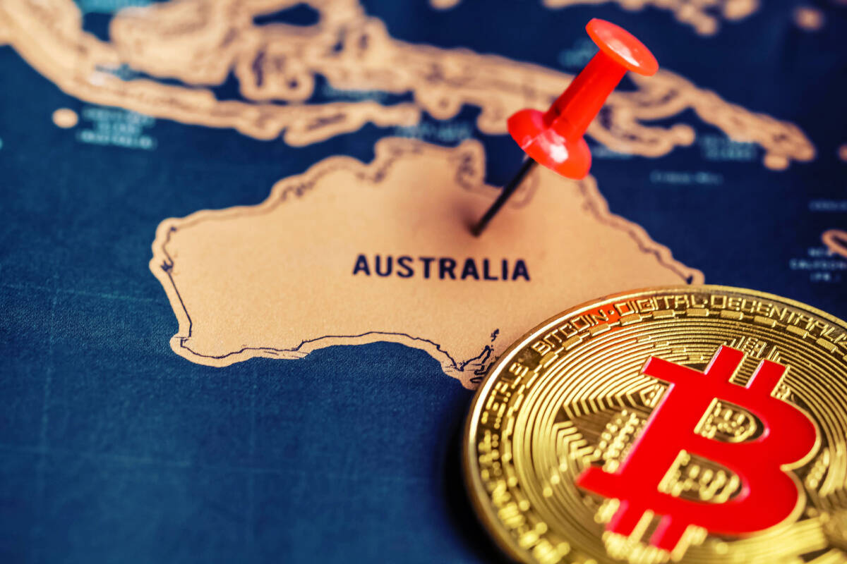 Australia on a map alongside BTC coin