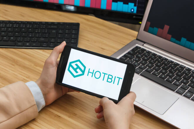 Hotbit logo on a phone