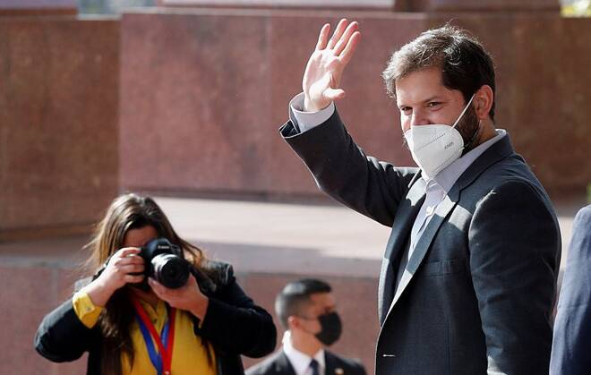 Chile's President Gabriel Boric waves after attending the annual balance of the Chilean congress in Valparaiso
