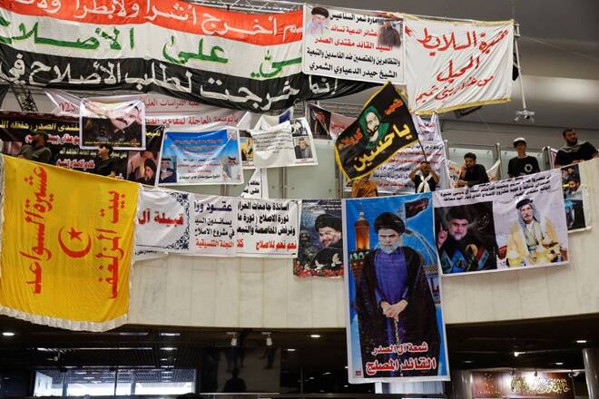 Supporters of Iraqi populist leader Moqtada al-Sadr gather for a sit-in at the parliament building