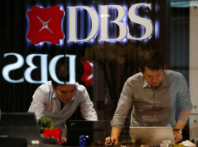 DBS signages are seen as office workers work in Singapore