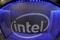 Computer chip maker Intel's logo is shown on a gaming computer display during the opening day of E3, the annual video games expo revealing the latest in gaming software and hardware in Los Angeles