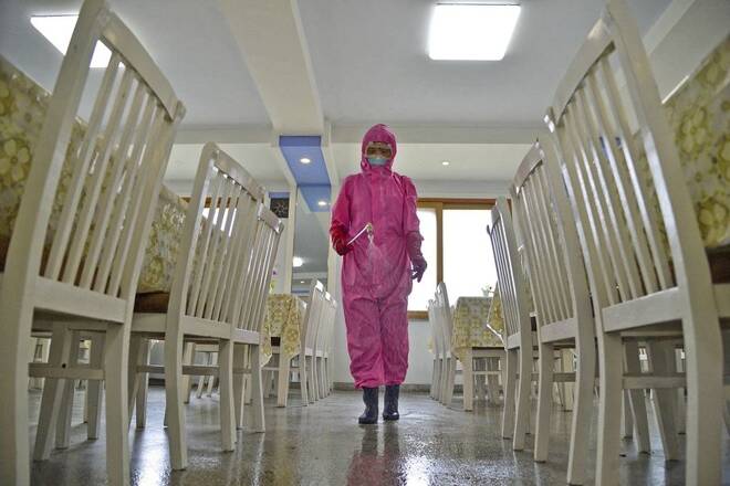 A worker disinfects a dining room at a sanitary supplies factory, amid growing fears over the spread of the coronavirus disease (COVID-19), in Pyongyang