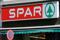 The logo of Austrian supermarket chain Spar is seen behind a traffic sign at a shop in Vienna