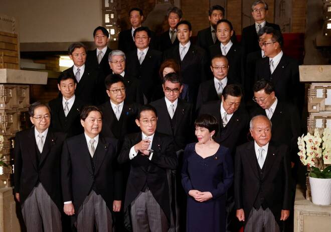Japan's Prime Minister Fumio Kishida and his cabinet ministers attend a photo session at Kishida's residence, in Tokyo