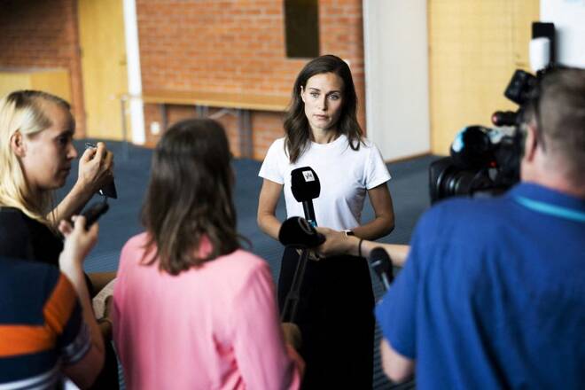 Finland's Prime Minister Sanna Marin speaks with members of the media in Kuopio