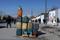 Cans containing gasoline are kept for sale on a road in Kabul
