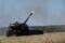 Ukrainian servicemen fire towards Russian troops on self-propelled AHS Krab howitzer as Russia's attack in Ukraine continues, in Donetsk region