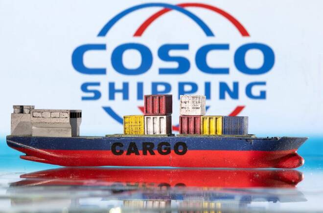 Illustration shows cargo boat model and China Ocean Shipping Company (COSCO) logo