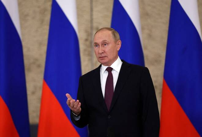 Russian President Putin attends a news conference in Samarkand