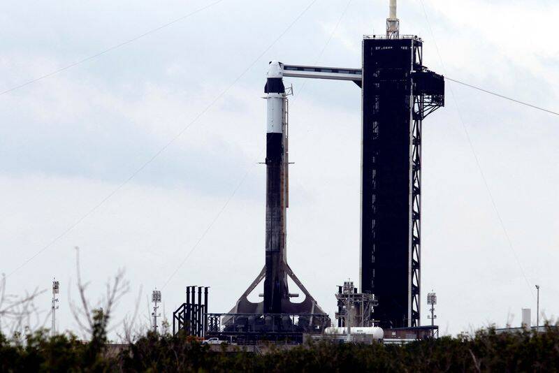 A SpaceX Falcon 9 with the Crew Dragon capsule stands on Pad-39A in preparation for the first private astronaut mission to the International Space Station