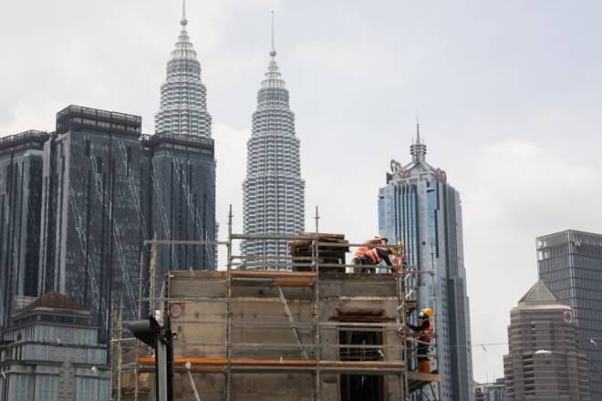 Workers work at a construction site, amid the coronavirus disease (COVID-19) pandemic, in Kuala Lumpur