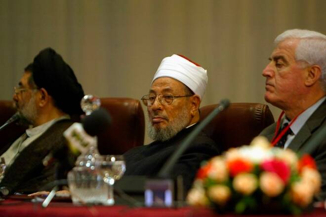 Egyptian-born cleric Sheikh Youssef al-Qaradawi attends opening session of Al-Quds conference in Algiers