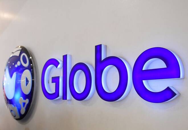 A logo of Globe Telecom is seen at a Globe service center in Edsa, Quezon City, metro Manila