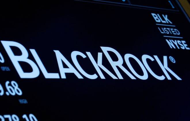 The company logo and trading information for BlackRock is displayed on a screen on the floor of the NYSE