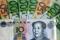 Euro and Yuan banknotes are seen in this picture illustration