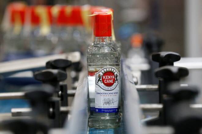 Kenya Cane spirit bottles are seen on a conveyor belt at the East African Breweries Limited factory in Ruaraka factory in Nairobi