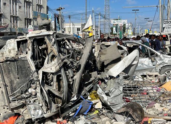 Wreckages of vehicles destroyed are seen at the scene of an explosion along K5 street in Mogadishu