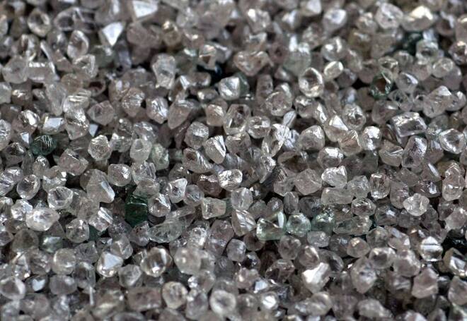 Rough diamonds during their sorting process are seen at the Botswana Diamond Valuing Company in ...